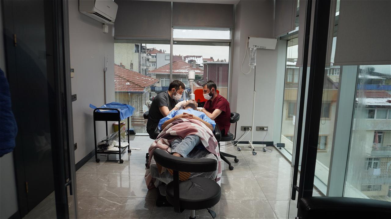 Hair restoration procedure in a private treatment room